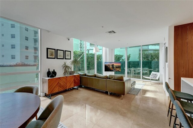 interior space with expansive windows and a wealth of natural light