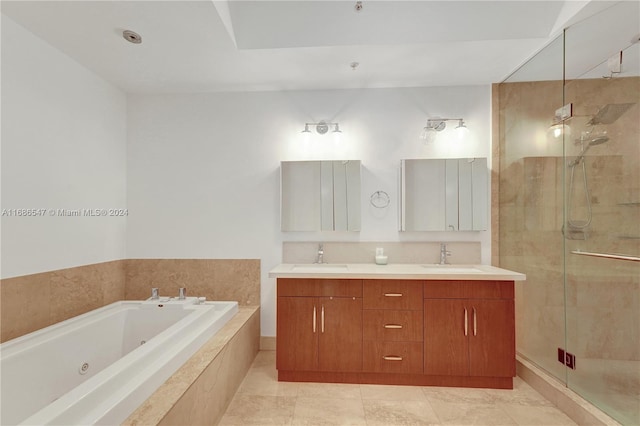 bathroom featuring tile patterned floors, vanity, and plus walk in shower