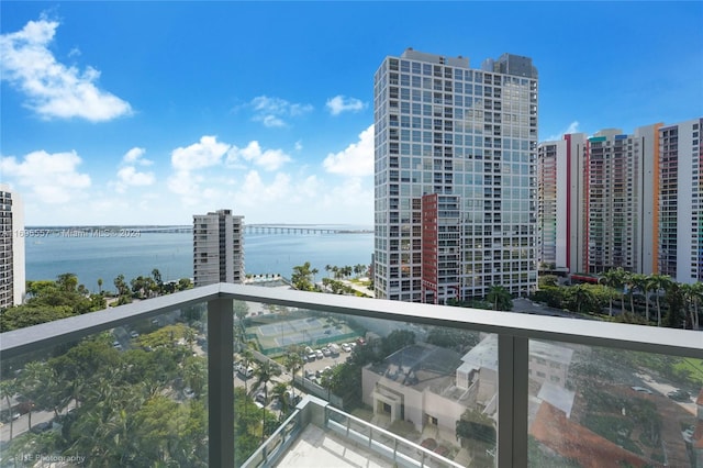 balcony featuring a water view