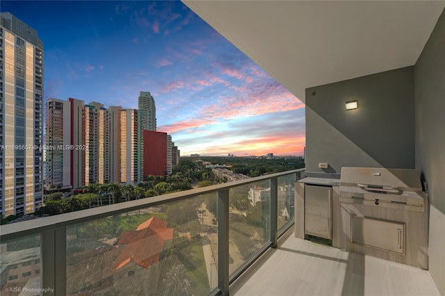 view of balcony at dusk