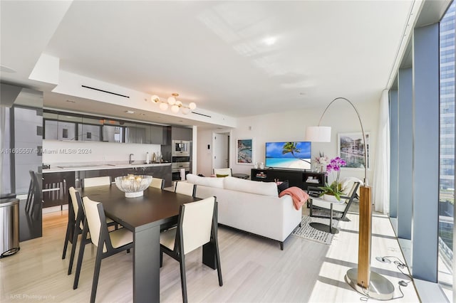 dining room featuring light hardwood / wood-style floors