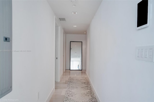 hallway featuring light wood-type flooring