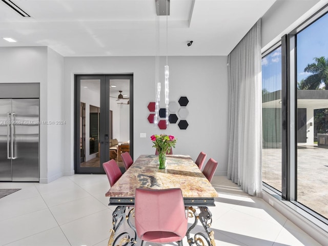 tiled dining area with french doors