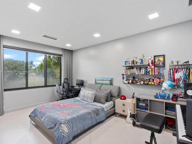 bedroom featuring light tile patterned flooring