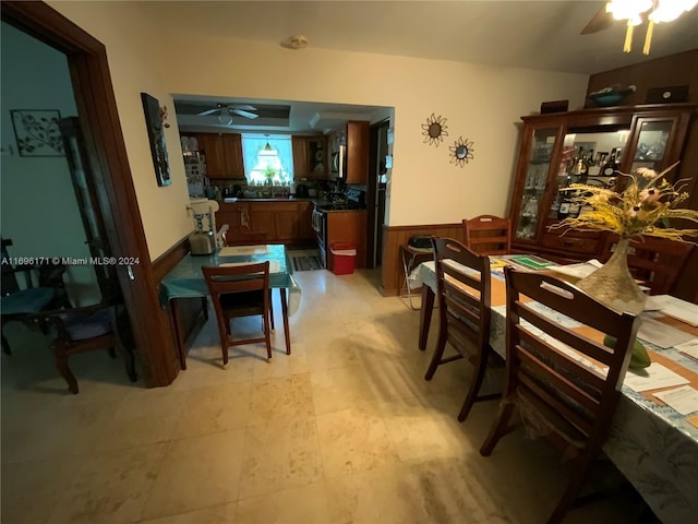 dining room featuring ceiling fan