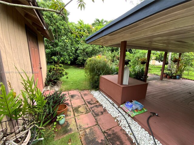 view of patio / terrace featuring a wooden deck