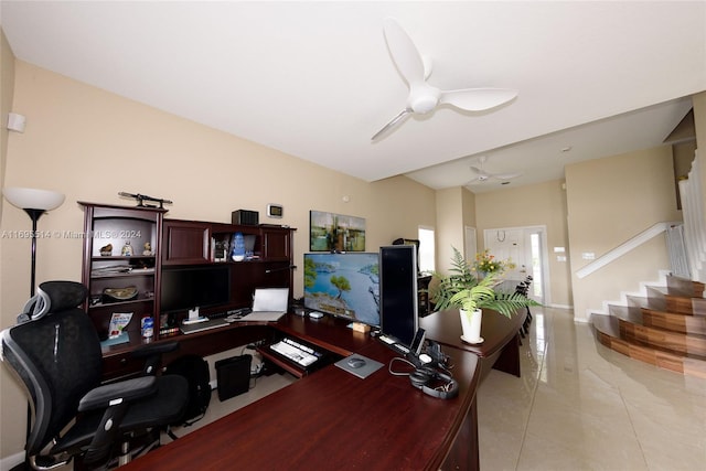 office featuring ceiling fan and light tile patterned flooring