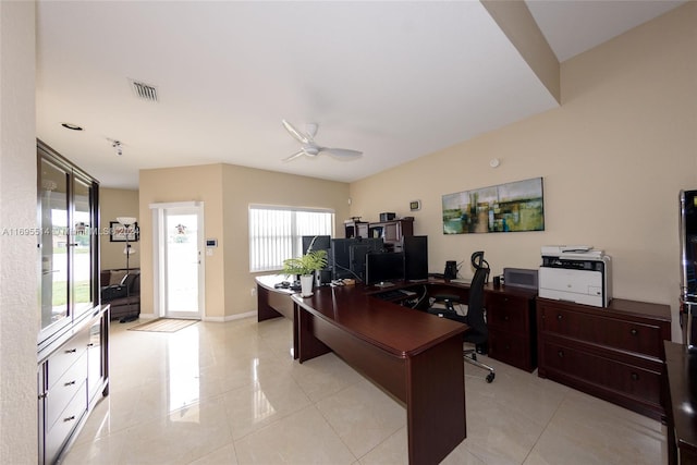 office space featuring light tile patterned floors and ceiling fan