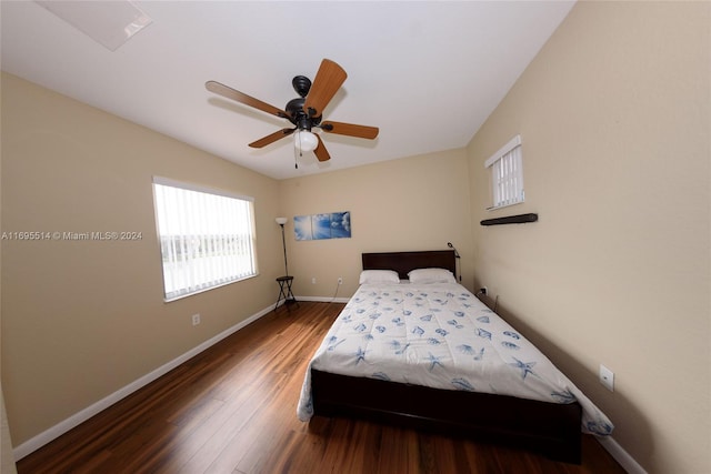 bedroom featuring ceiling fan and dark hardwood / wood-style flooring