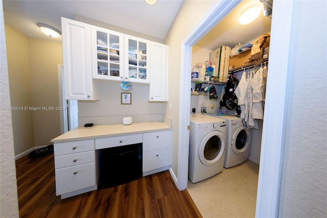 laundry room with dark hardwood / wood-style flooring and separate washer and dryer