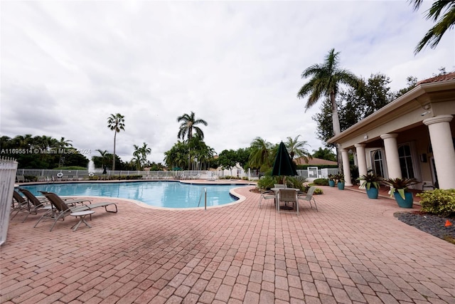 view of pool featuring a patio area