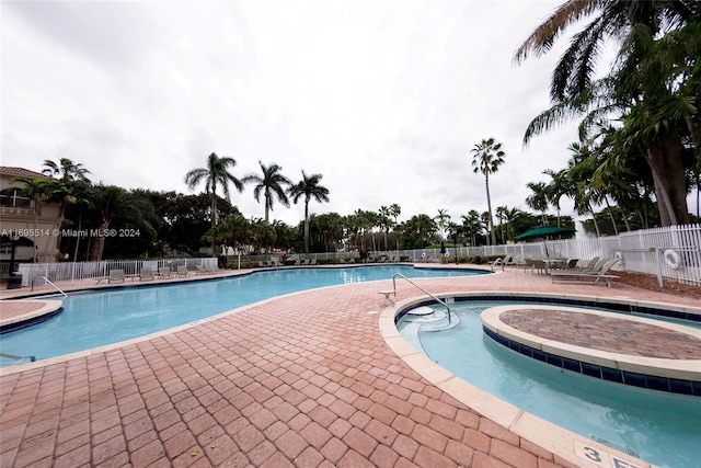 view of pool with a patio area