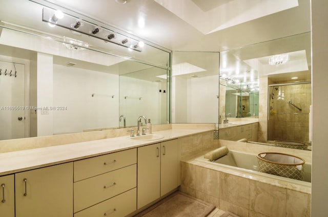 bathroom with vanity and plus walk in shower