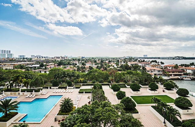 birds eye view of property featuring a water view