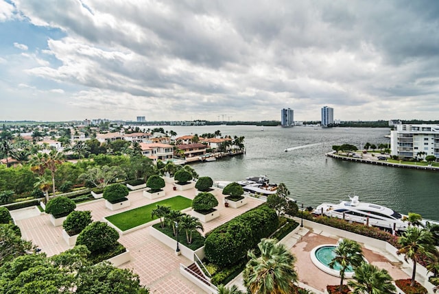 birds eye view of property featuring a water view