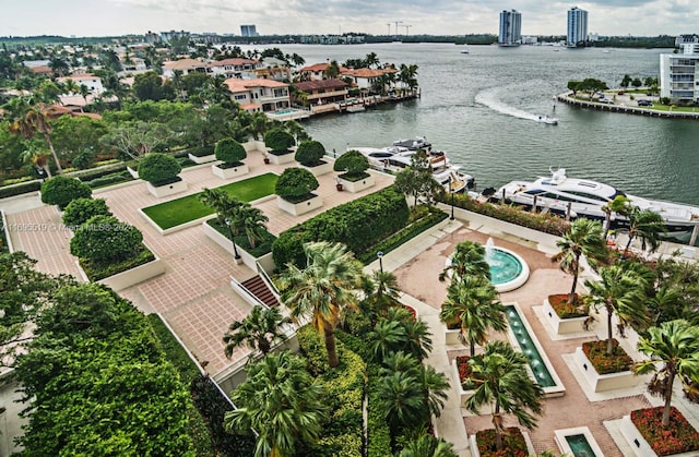 birds eye view of property featuring a water view