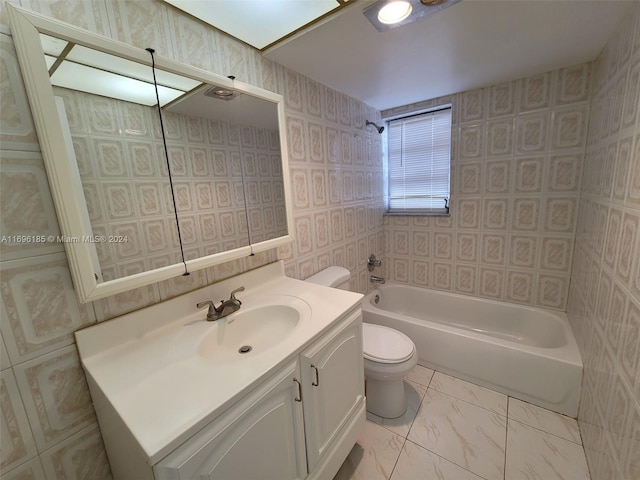 full bathroom featuring vanity, toilet, and  shower combination