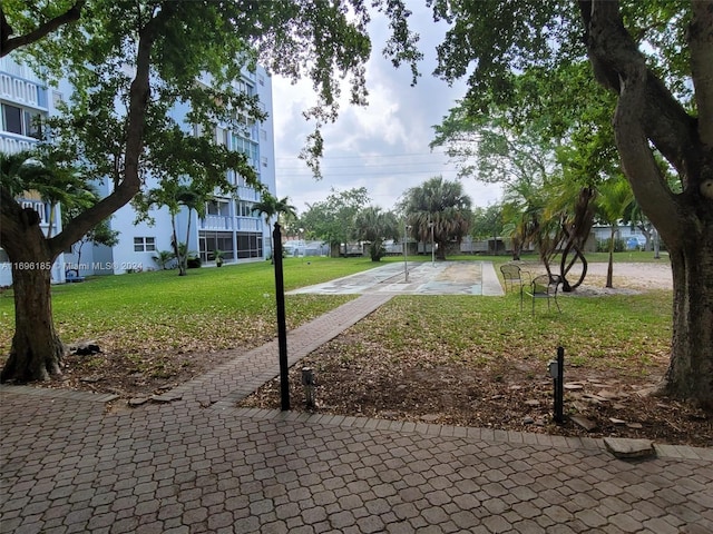 surrounding community featuring a lawn