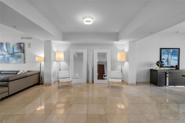 interior space featuring light tile patterned floors