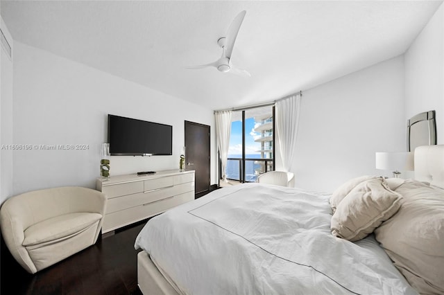 bedroom featuring ceiling fan, access to exterior, and wood-type flooring