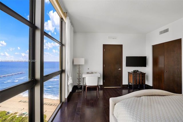 bedroom featuring dark hardwood / wood-style floors