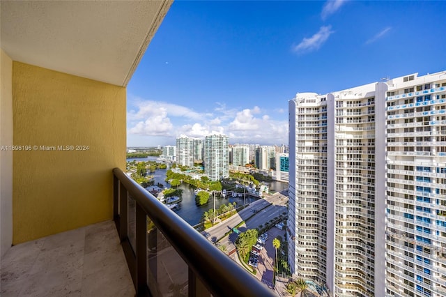 balcony featuring a water view