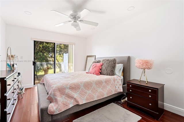 bedroom featuring access to outside, ceiling fan, and dark hardwood / wood-style flooring