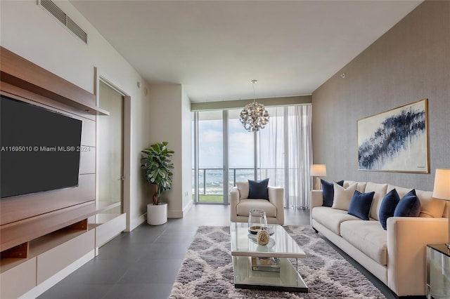 living room featuring a notable chandelier