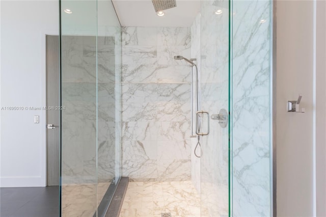 bathroom featuring an enclosed shower