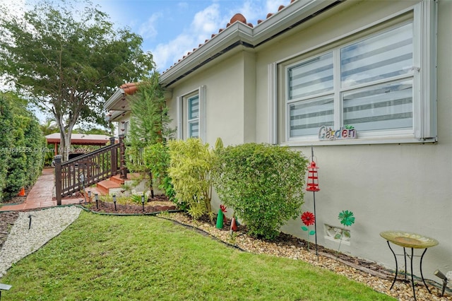 1900 SW 21st Ave, Miami, FL 33145 - view of home's exterior featuring stucco siding and a yard