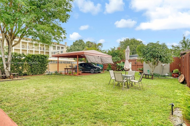 1900 SW 21st Ave, Miami, FL 33145 - fenced backyard with a carport