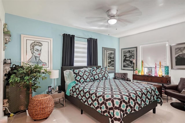 tiled bedroom with ceiling fan