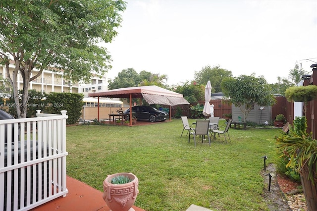 1900 SW 21st Ave, Miami, FL 33145 - fenced backyard with a carport