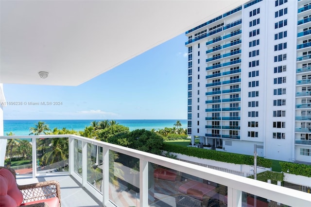 balcony featuring a water view