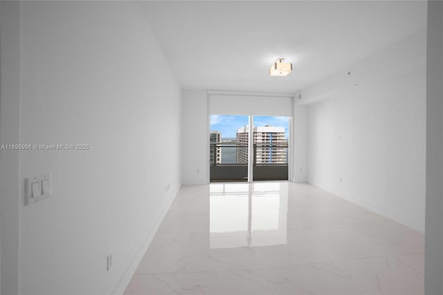 1080 Brickell Ave Unit 3604, Miami, FL 33131 - spare room featuring light marble finish floors