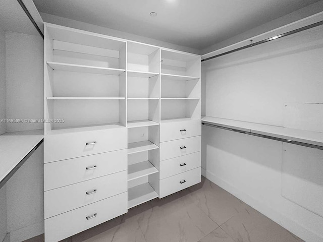 1080 Brickell Ave Unit 3604, Miami, FL 33131 - spacious closet with dark marble finish flooring