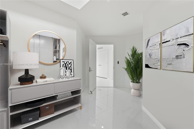 corridor with tile patterned floors