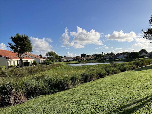 view of yard with a water view