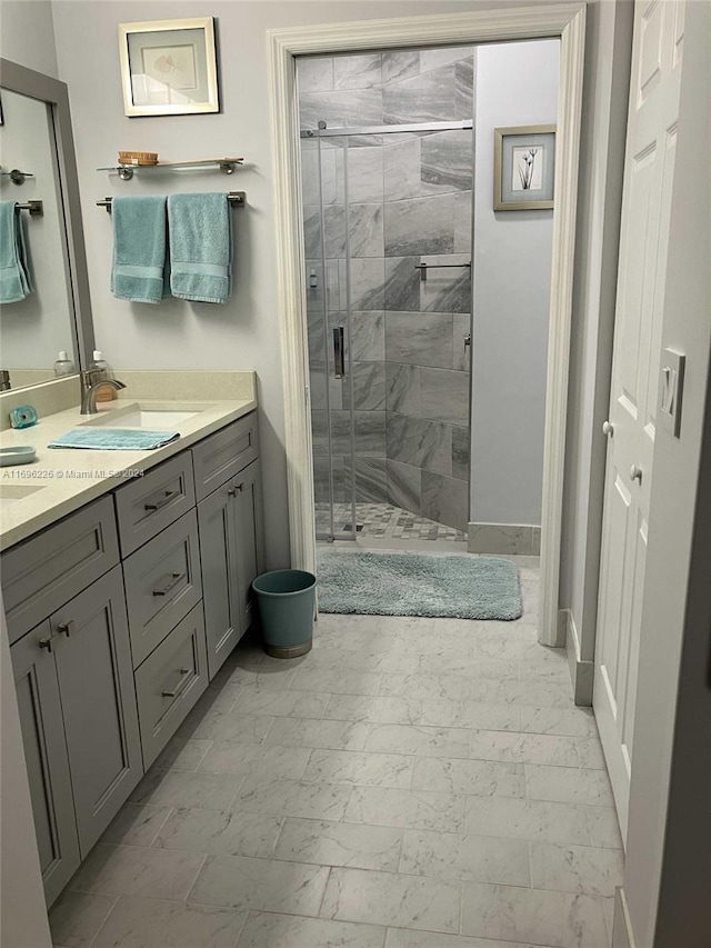 bathroom with vanity and walk in shower