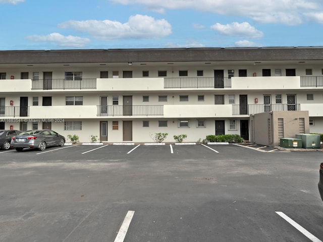 view of property featuring central AC unit