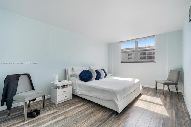 bedroom featuring dark hardwood / wood-style floors