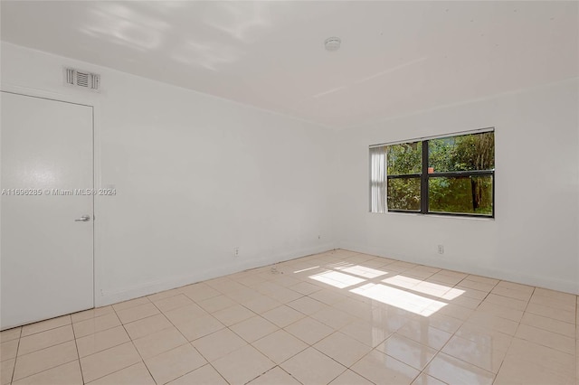 view of tiled spare room