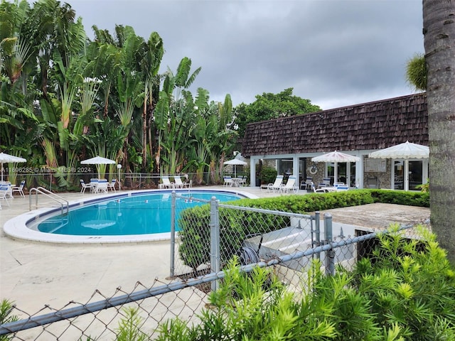 view of pool with a patio area