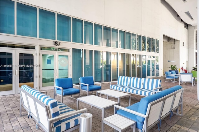 view of patio with french doors and an outdoor living space