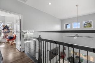 hallway with dark wood-type flooring