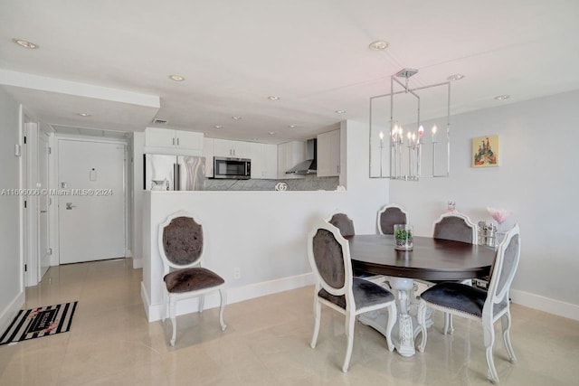 dining space with a notable chandelier