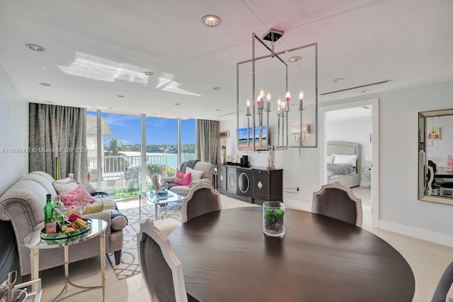 dining space featuring a notable chandelier