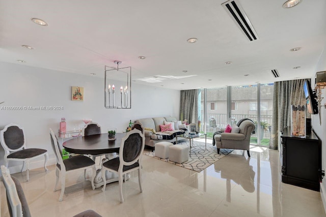 tiled dining area with a notable chandelier and expansive windows