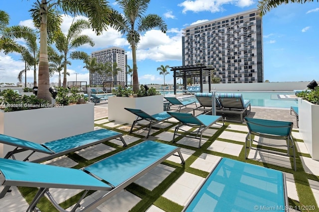 view of pool featuring a patio area and outdoor lounge area