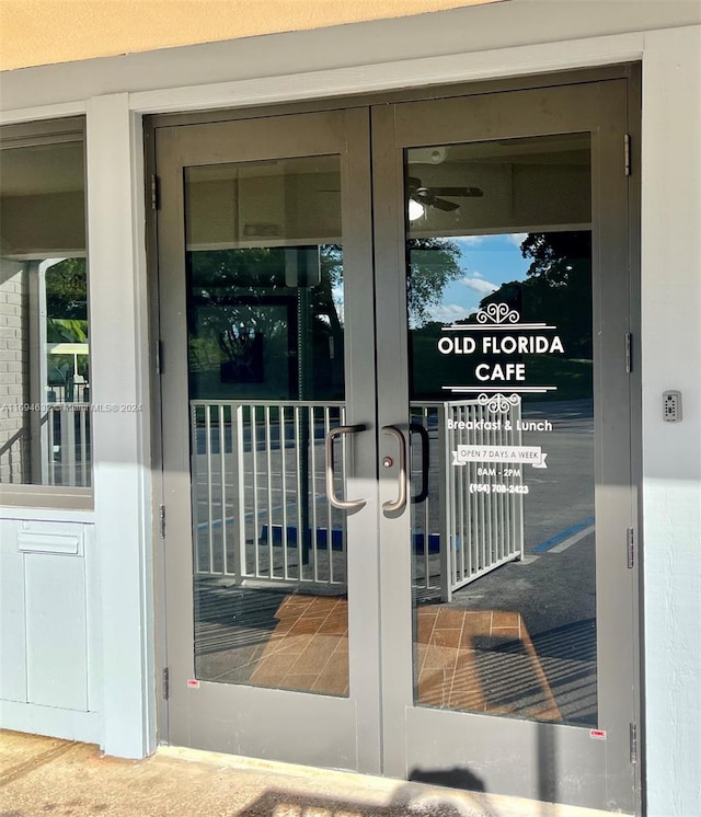 view of exterior entry featuring french doors